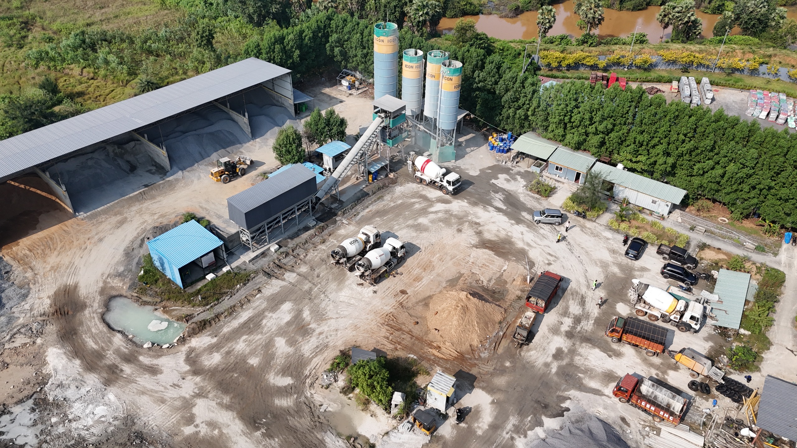 ICON RMC plant — aerial view with cement silos and transit-mixer fleet